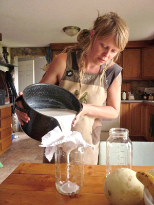 Erin strains goat milk