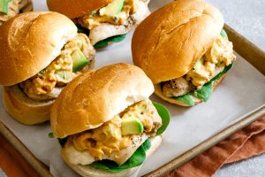 Avocado Hummus Chicken Sliders on a platter