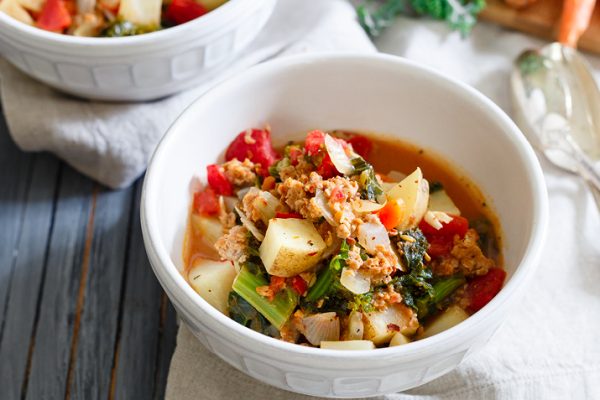 Sausage, Kale and Potato Soup in a single serving bowl