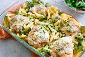 Chicken and baked penne topped with Asiago cheese sauce