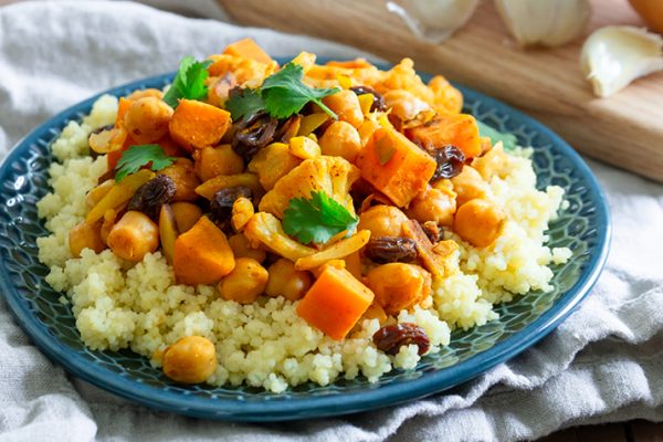 Moroccan Vegetable Tagine with Chickpeas atop couscous