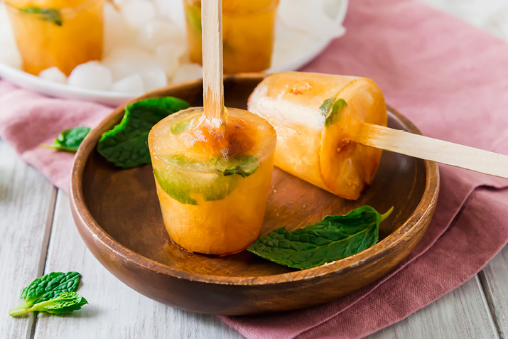 Homemade green tea mint ice pops on a plate