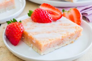 Strawberry Lemon Bar Squares on Plates