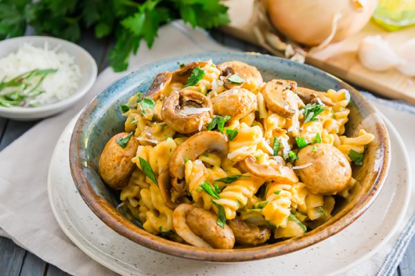 Creamy Pumpkin Pasta with Seared Mushrooms in a bowl