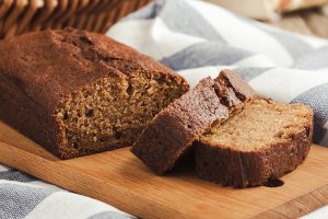 Sliced Spiced Winter Squash Bread on a Cutting Board