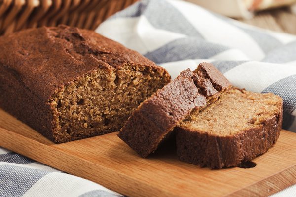 Sliced Spiced Winter Squash Bread on a Cutting Board